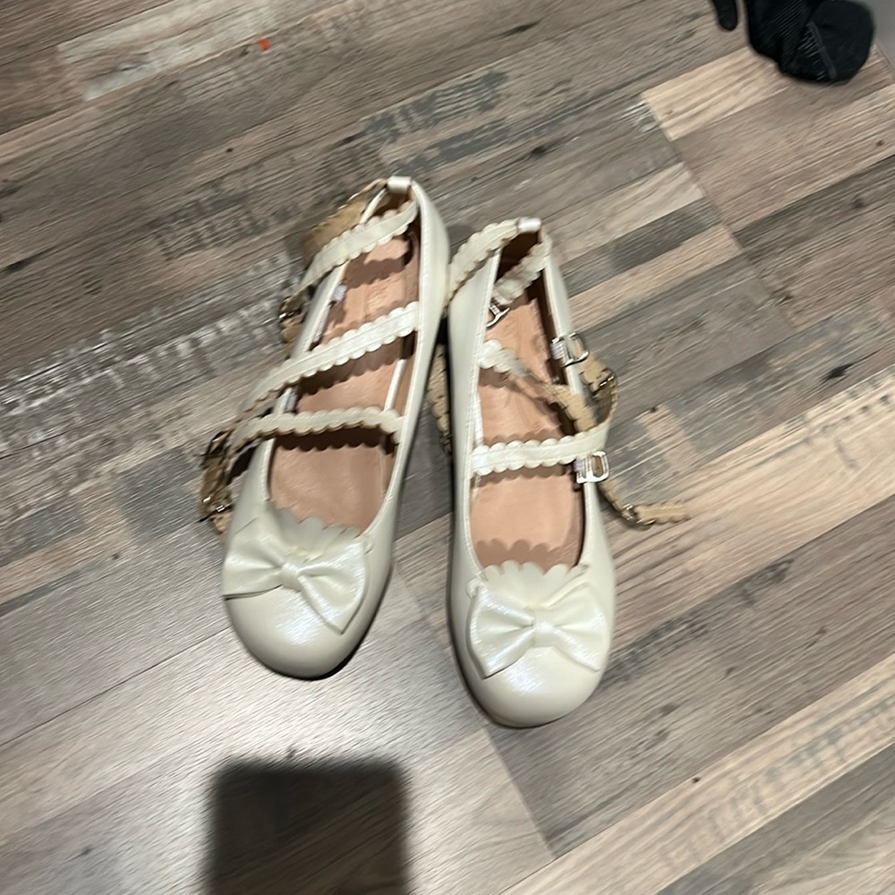 Like new white pumps